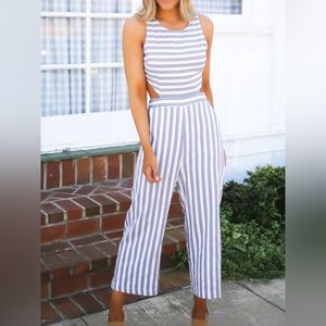 Magnolia Boutique Striped Cut-Out Jumpsuit                    [size Medium]